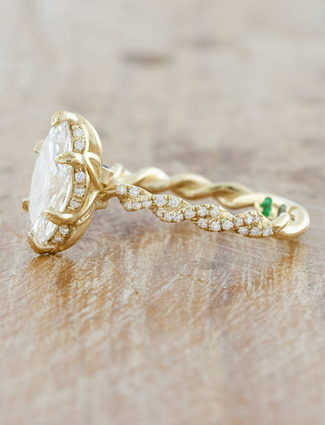 caption:Shown in 14k yellow gold option, customized with colored stones inside band