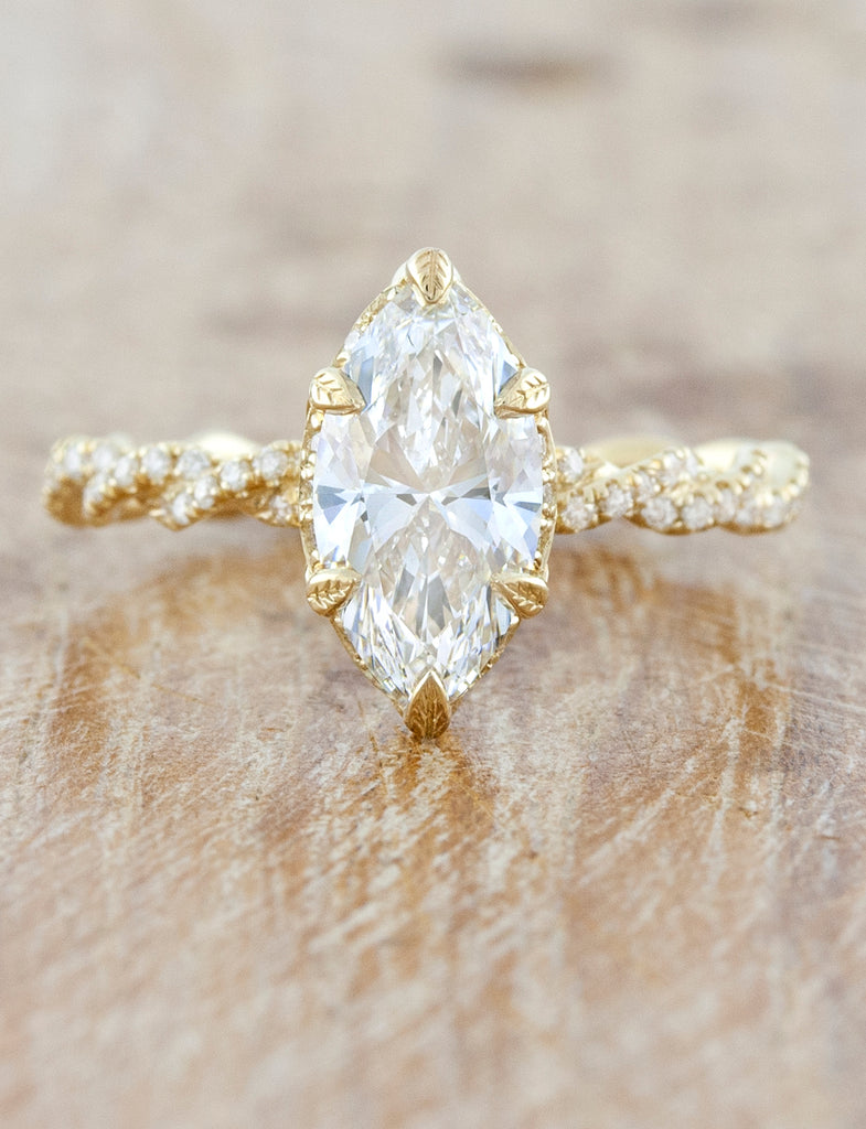 caption:Shown with 1.00 carat center diamond in 14k yellow gold option