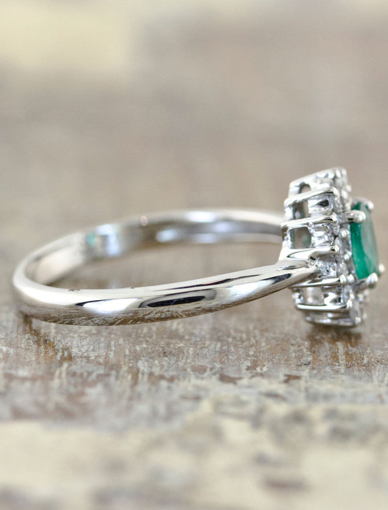 Emerald halo engagement ring