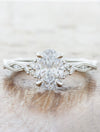 caption:Shown with 1.40ct oval diamond in platinum