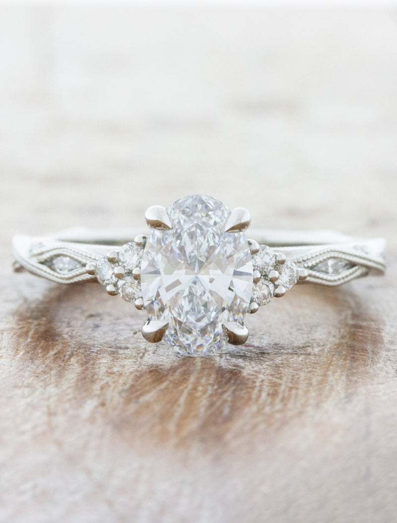 caption:Shown with 1.40ct oval diamond in platinum