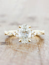 caption:Shown with 1.50ct oval diamond in 14k yellow gold