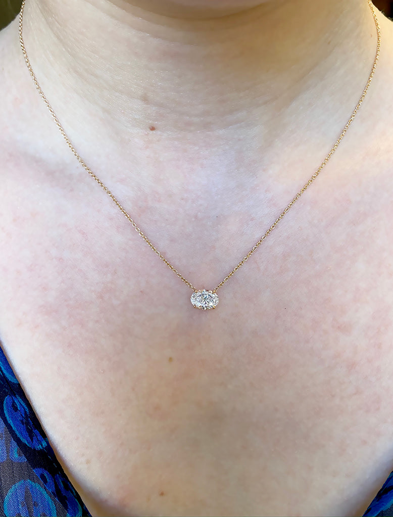 caption:Shown with 1ct oval diamond in 14k rose gold