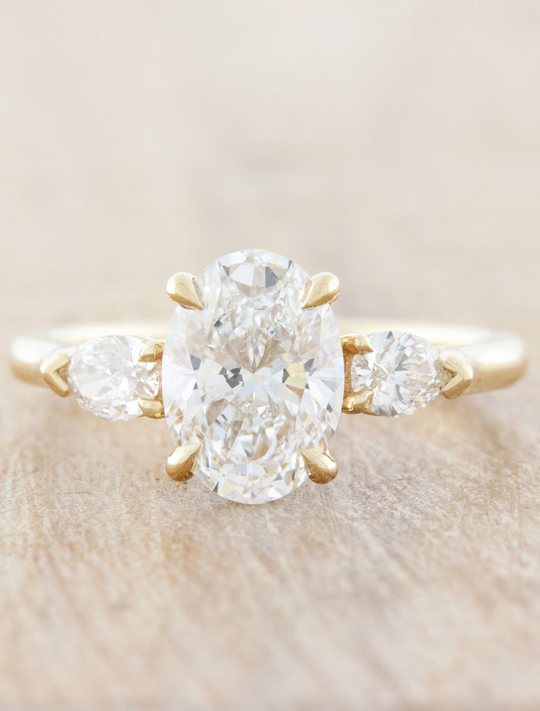 caption:1.51ct oval diamond in 14k yellow gold