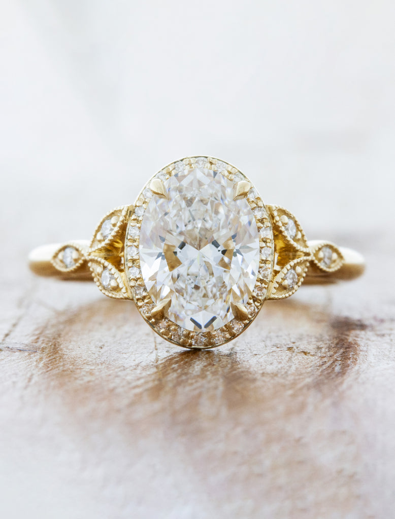 caption:1.54ct oval diamond in 14k yellow gold
