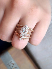 Vintage inspired engagement ring;caption:2.00ct. Marquise Diamond 14k Rose Gold paired with Lusia and Adelixa wedding bands