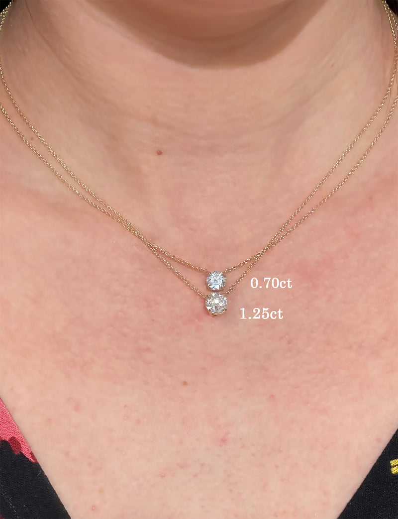 caption:Shown with 0.7ct & 1.25ct round diamonds