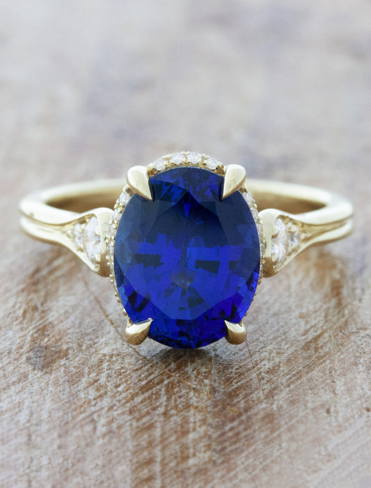 caption:Shown with 3.70ct blue sapphire in 14k yellow gold