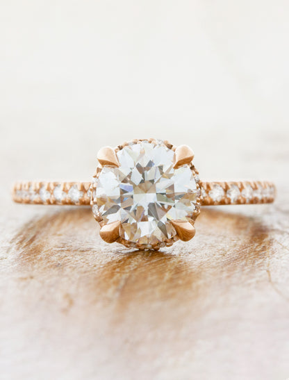 caption:1.25ct round diamond in 14k rose gold