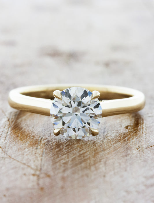 caption:Shown with 1.50ct round diamond in 14k yellow gold