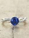 caption:Shown with round sapphire in 14k white gold