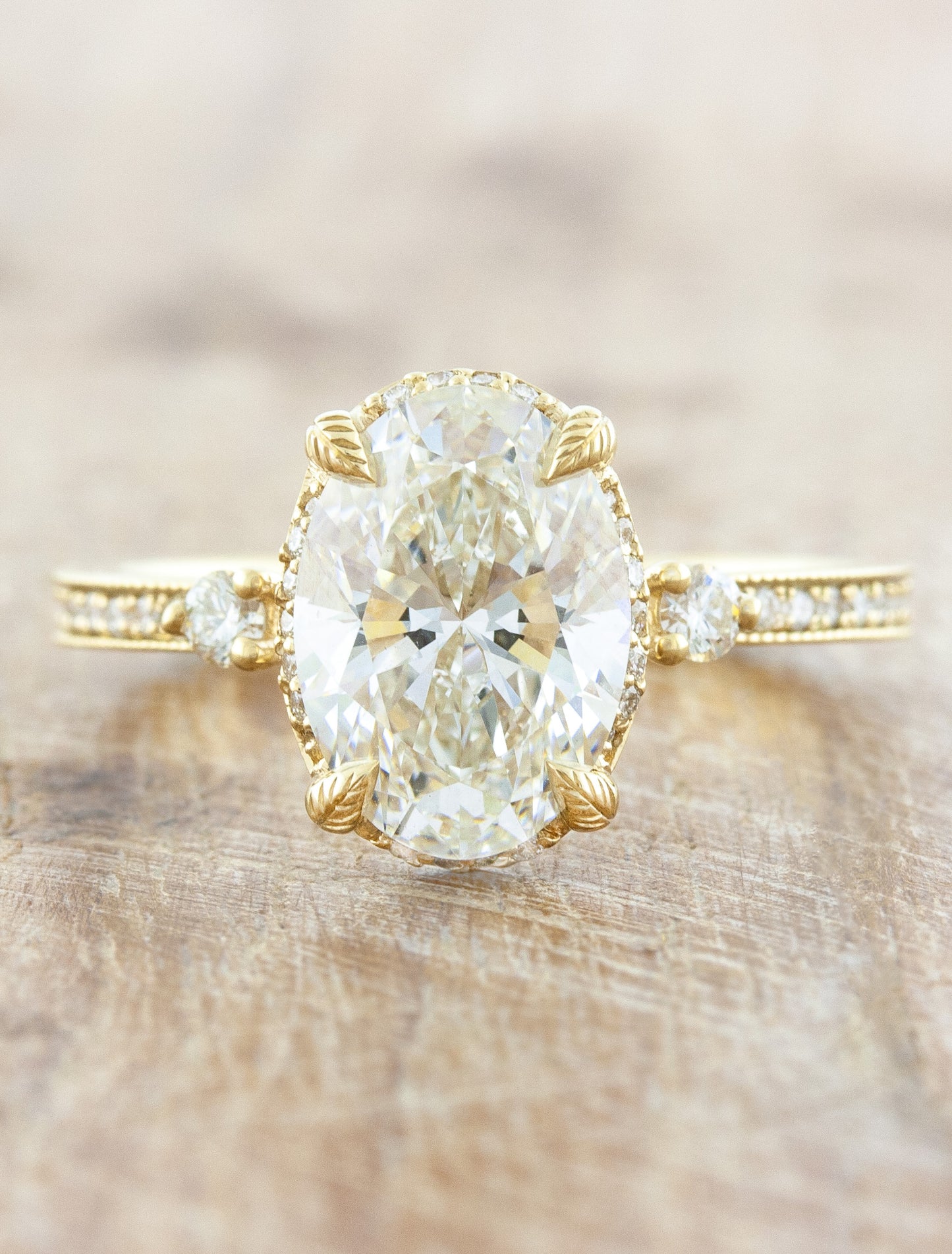 caption:2.45ct oval diamond in 14k yellow gold