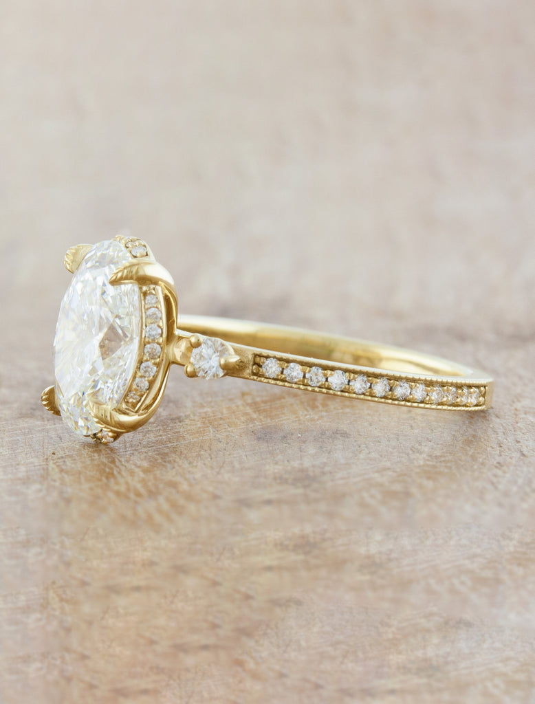caption:2.45ct oval diamond in 14k yellow gold