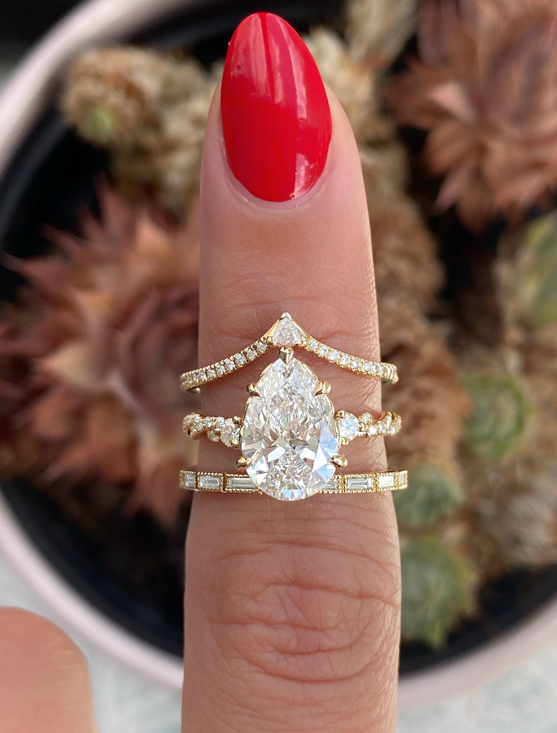 Shanel: Three-Stone Engagement Ring with Twisted Band Floral