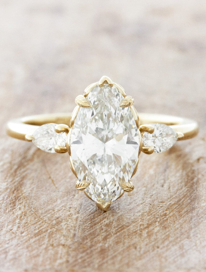 caption:Shown with 2.20ct marquise diamond in 14k yellow gold