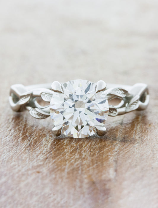 caption:Shown with 1.70ct round diamond in platinum