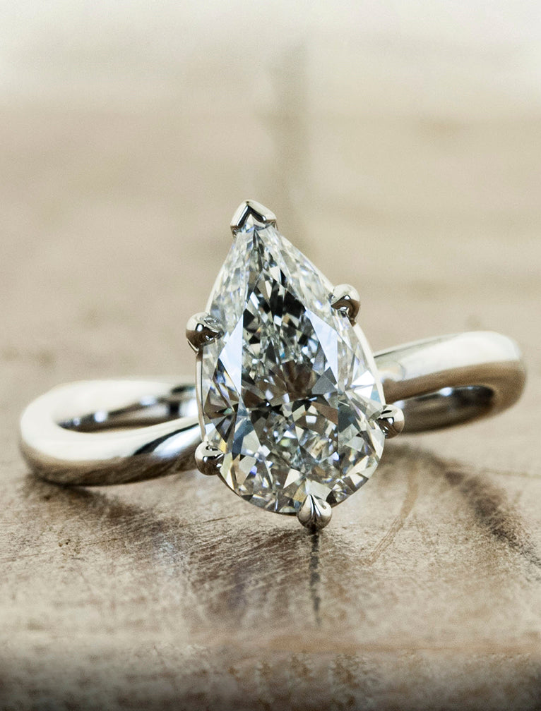 modern pear shaped diamond ring;caption:2.09ct. Pear Diamond Platinum