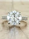 caption:Shown with 3.02ct round diamond in platinum