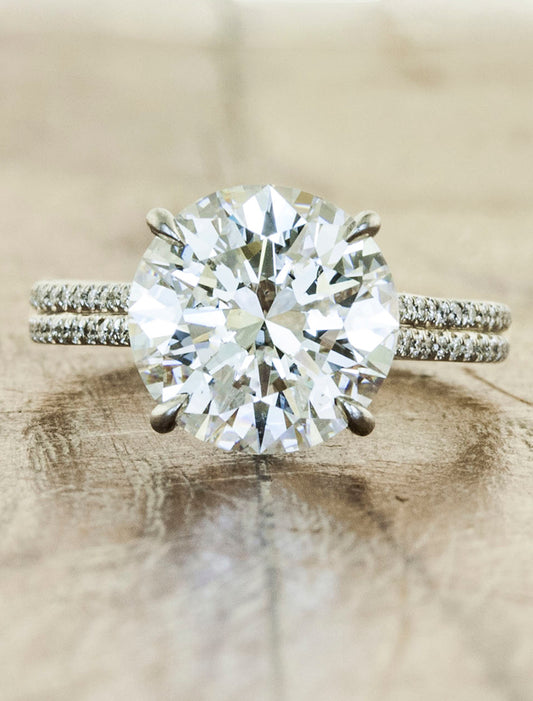 caption:Shown with 3.02ct round diamond in platinum