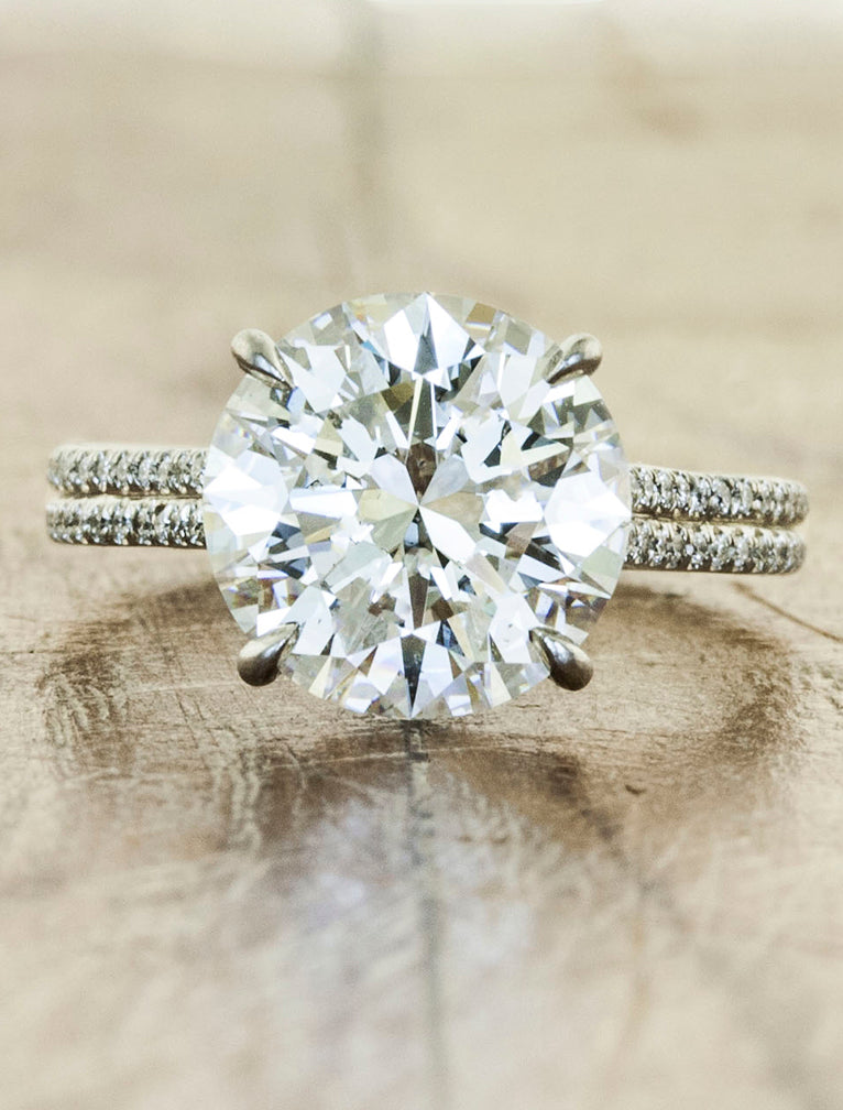 caption:Shown with 3.02ct round diamond in platinum
