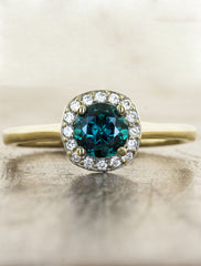 caption:Shown in 14k yellow gold, and customized with green sapphire center stone