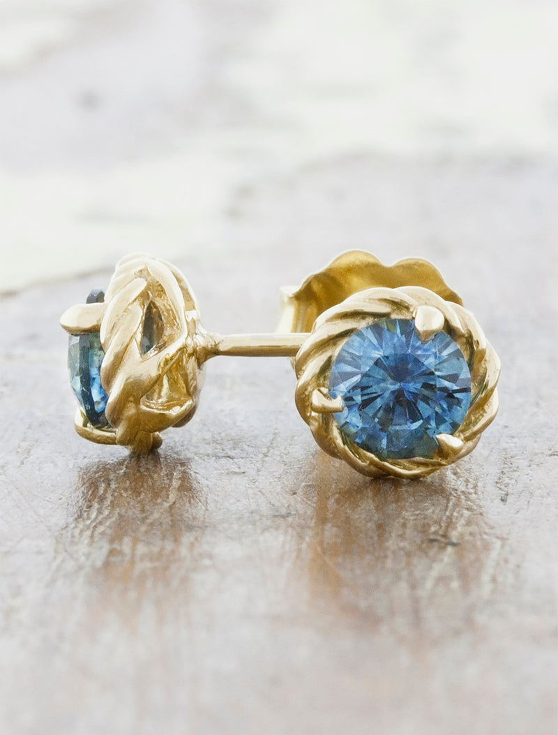 caption:Customized with round sapphires in yellow gold