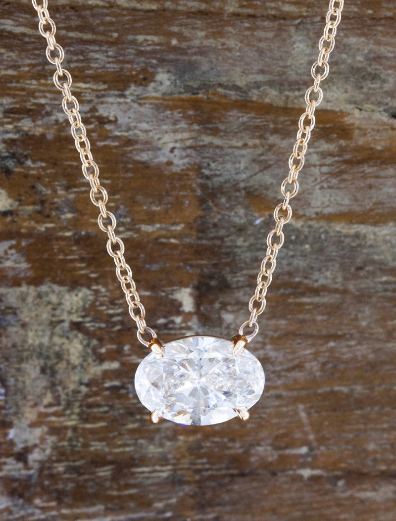 caption:Shown with 1ct oval diamond in 14k rose gold