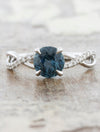 caption:Shown with round sapphire in platinum