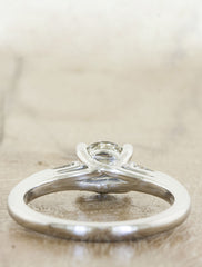 3-stone round diamond ring with baguette accents