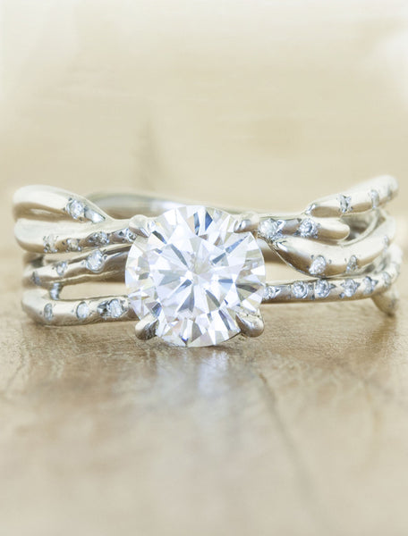 unique split shank diamond engagement ring with diamond accents. caption:1.00ct. Round Diamond Platinum paired with Selene wedding band