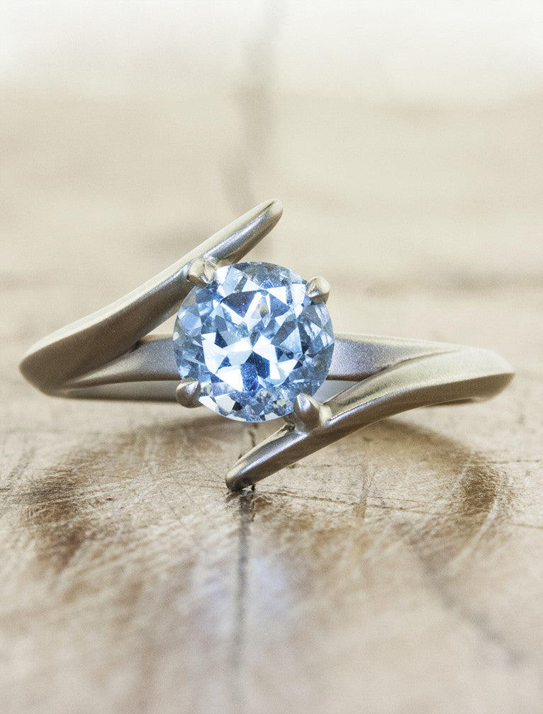 Unique modern engagement ring. caption:Customized with an 1.20ct. Round Aquamarine, Platinum and sandblast finish