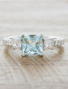 caption:Shown with princess cut aquamarine in platinum