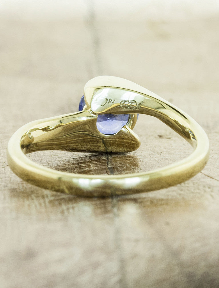 asymmetrical band sapphire engagement ring