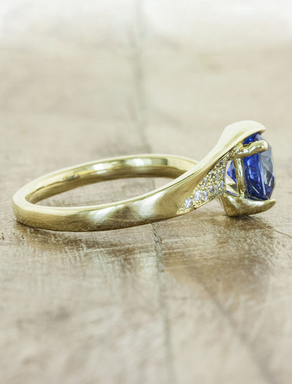 asymmetrical band sapphire engagement ring in yellow gold 