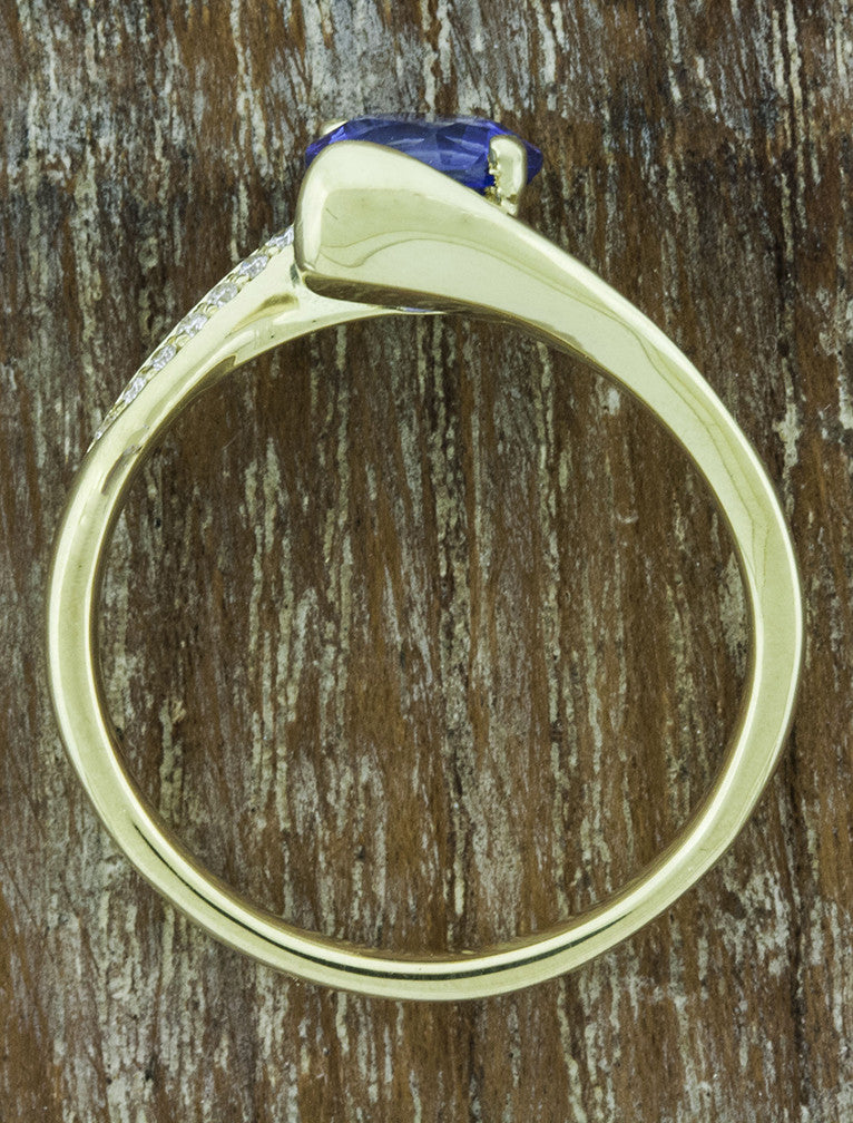 asymmetrical band sapphire engagement ring