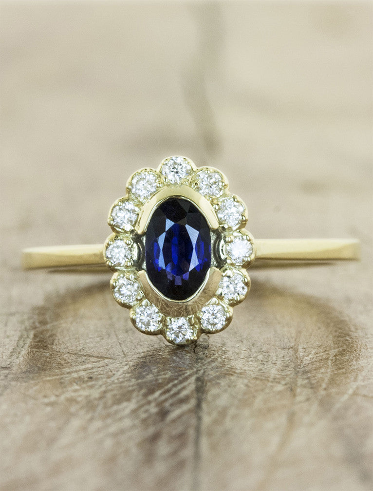 delicate halo, oval sapphire engagement ring