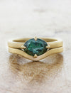 oval sapphire in brushed yellow gold band with matching ring