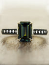 caption:Shown with 3.04ct emerald cut green sapphire in 14k yellow gold