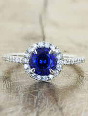 diamond halo sapphire engagement ring by Ken & Dana Design. caption:Customized with a blue sapphire center stone