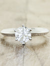 caption:Shown with round diamond in 14k white gold