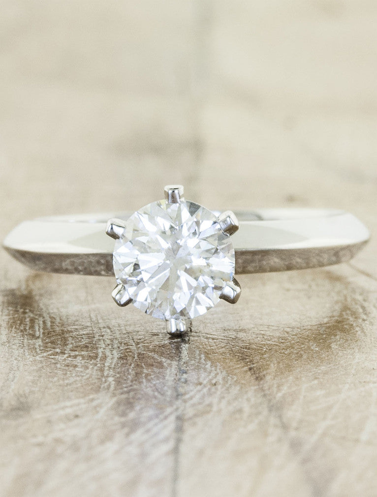 caption:Shown with round diamond in 14k white gold