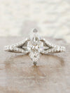 caption:Shown with marquise diamond in platinum