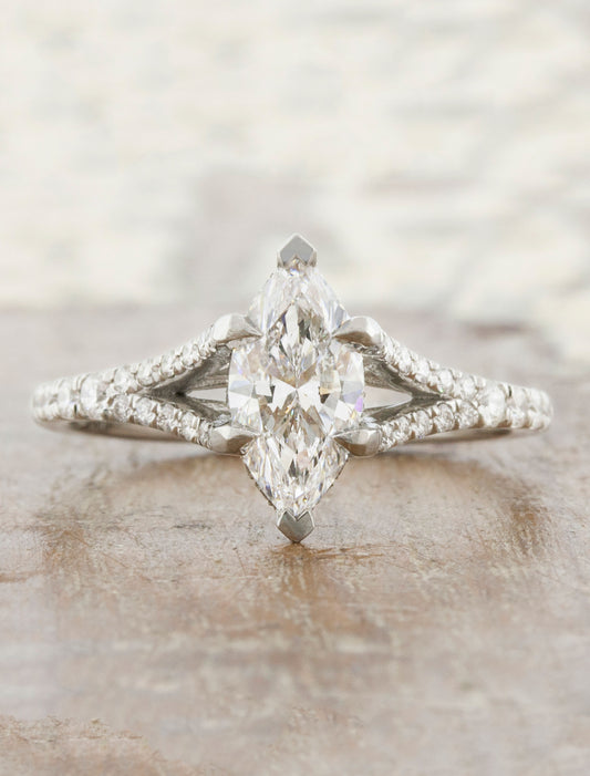 caption:Shown with marquise diamond in platinum
