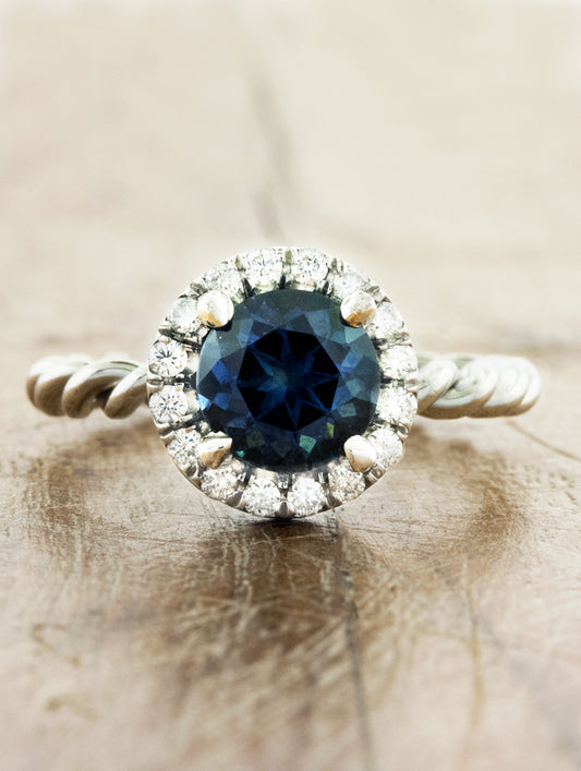 caption:Shown with round Montana sapphire in platinum