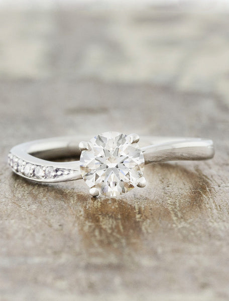sculptural band diamond solitaire engagement ring. caption:Shown with 0.57ct diamond