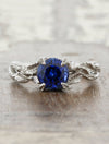 caption:Shown with round blue sapphire in platinum