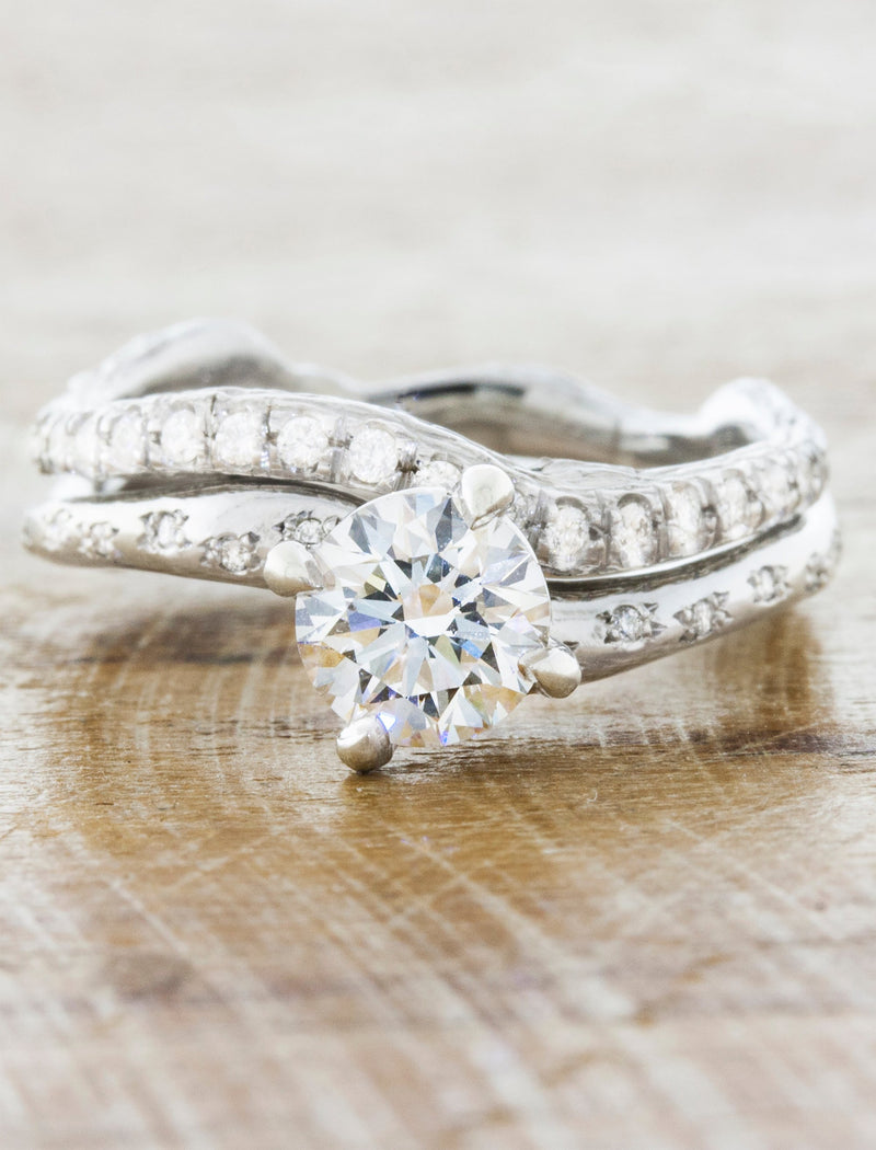 caption:Paired with Aurora-Diamonds engagement ring