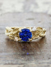 caption:Shown with round blue sapphire in yellow gold