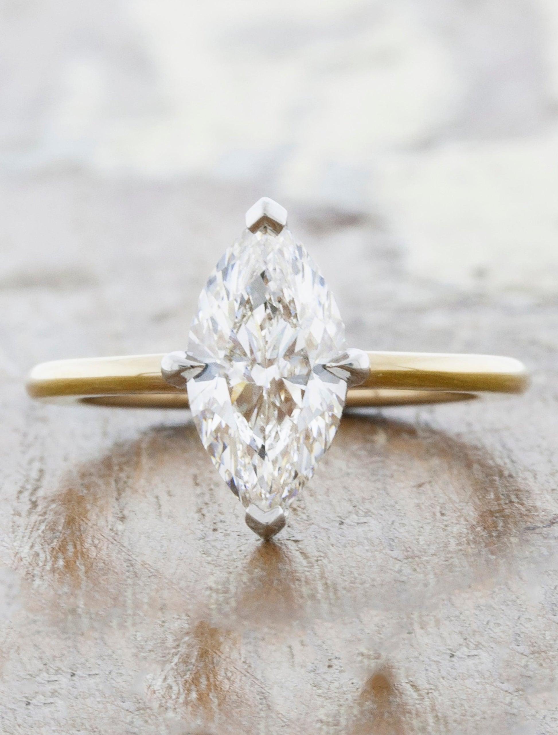 Jebaun: Low Profile Solitaire Engagement Ring with Hidden Halo