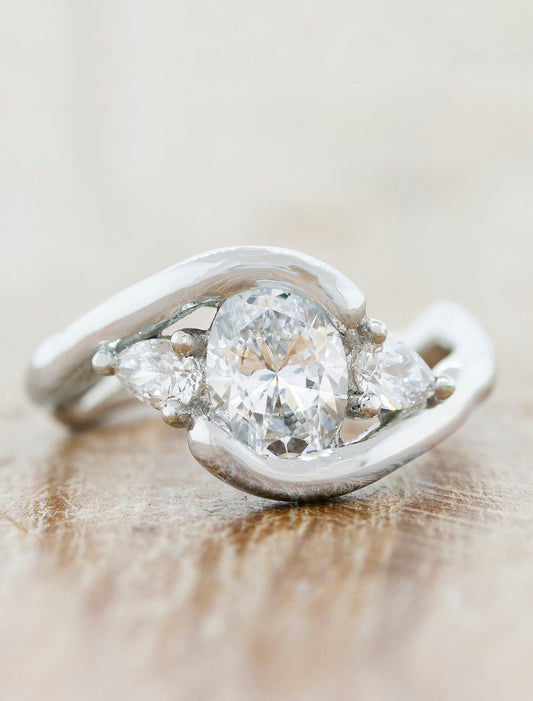 caption:Shown with 1.5ct oval diamond in platinum